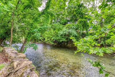 River View located on the shore of the Little Pigeon River