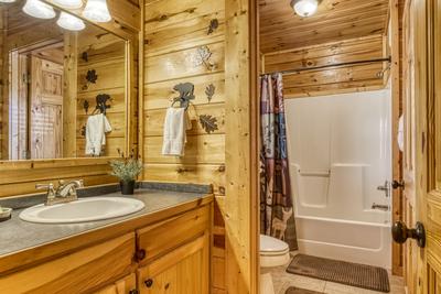 A Stone's Throw main level bathroom with tub/shower combo