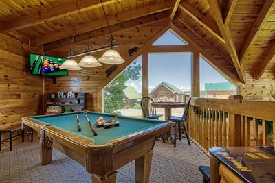 A Stone's Throw upper level loft game room with pool table