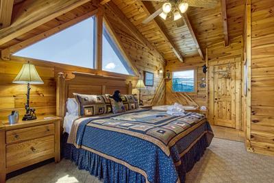 A Stone's Throw upper level bedroom with king size bed