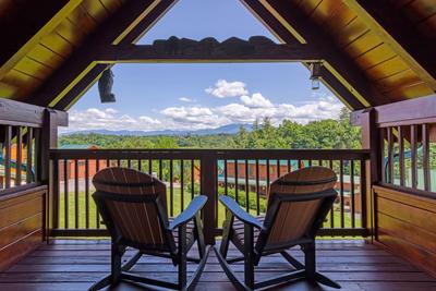 A Stone's Throw upper level private balcony with mountain view