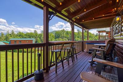 A Stone's Throw covered back deck with bar top