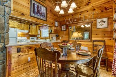 Campfire Lodge dining table and fully furnished kitchen