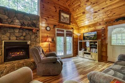 Campfire Lodge living room with seasonal gas fireplace