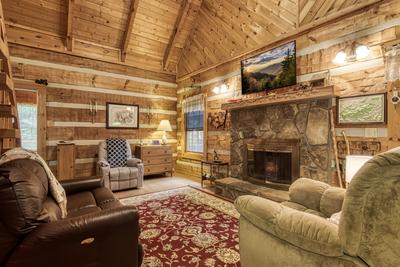 Striking in the Smokies living room with fireplace