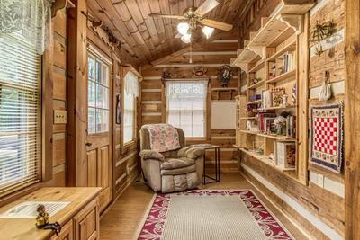 Striking in the Smokies sun room with recliner