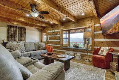 Secluded Summit living room with cushioned bay window