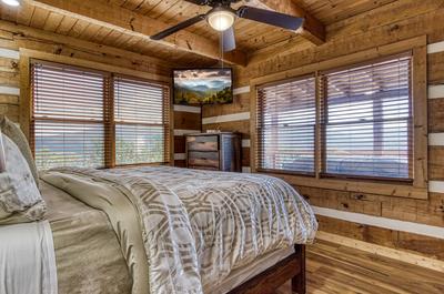 Secluded Summit bedroom with king bed and flat screen TV