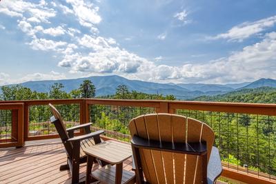 Secluded Summit front deck with panoramic mountain views