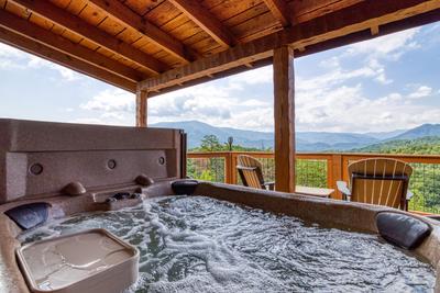 Secluded Summit hot tub with panoramic mountain views