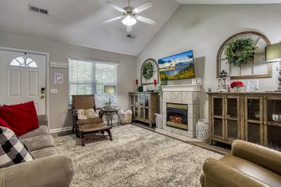 Sparkling Waters living room with 50 inch TV