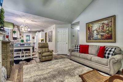 Sparkling Waters living room with recliner 