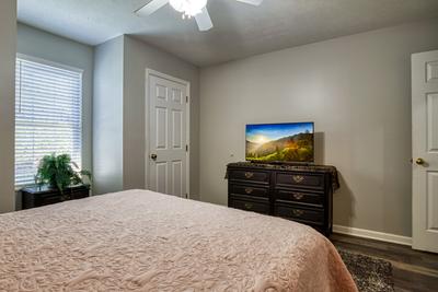 Sparkling Waters bedroom with queen size bed and 40 inch TV