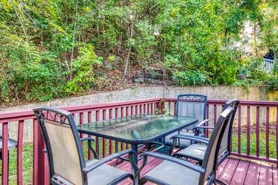 Sparkling Waters back deck with table and chairs