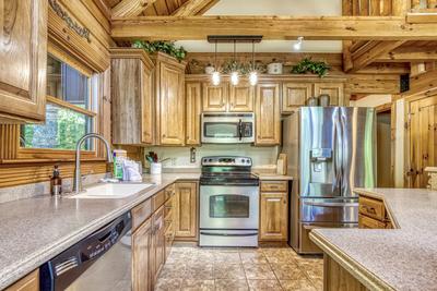 Blue Sky fully furnished kitchen with stainless steel appliances