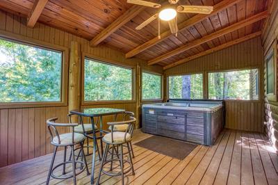 Blue Sky screened in back deck with hot tub