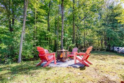 Blue Sky fire pit in a wooded setting