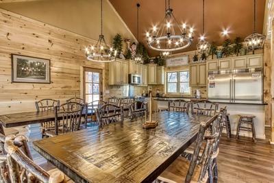 The Lodge at Burg Hill dining room with 2 large dining tables with seating for 8 at each