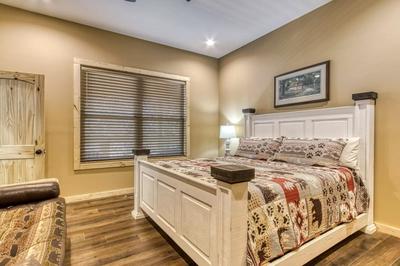 The Lodge at Burg Hill main level bedroom with king size bed