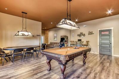 The Lodge at Burg Hill game room with pool table and poker table