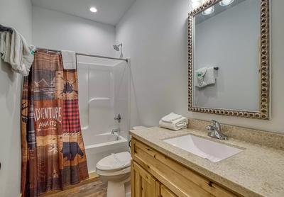 The Manor at Burg Hill upper level bathroom with tub/shower combo