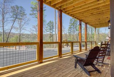 The Manor at Burg hill covered deck with rocking chairs 