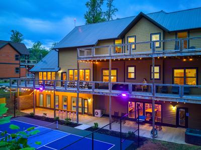 The Lodge at Burg Hill large decks overlooking pickle ball / basketball court