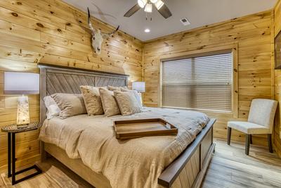 Midnight Bowling main level bedroom with king size adjustable bed