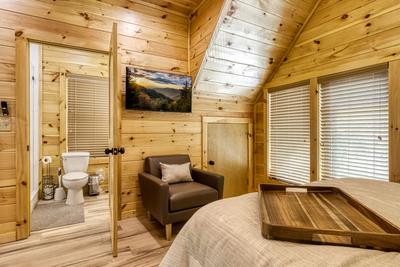 Midnight Bowling loft bedroom with 40 inch TV and private bathroom