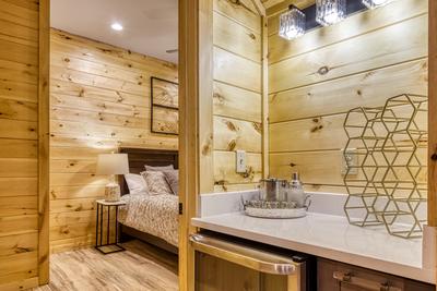 Midnight Bowling lower level wet bar and bedroom