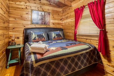 Lazy Man's Way upper level bedroom with king size bed