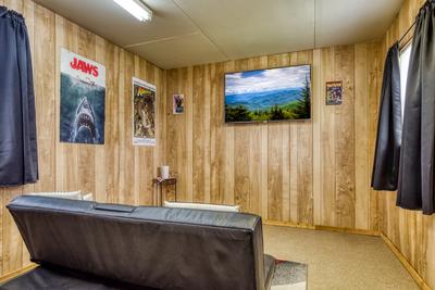 Lazy Man's Way entertainment shed with TV and futon