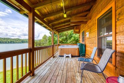 Lazy Man's Way covered back deck with hot tub