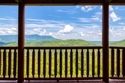 Wet and Wild main level deck with panoramic mountain views