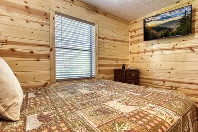 Heavenly Gaze bedroom with queen size bed and 40 inch TV