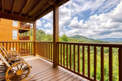 Awesome Views main level deck with rocking chairs