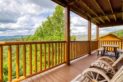 Awesome Views main level deck with rocking chairs and picnic table