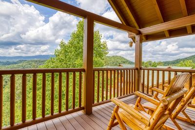 Awesome Views upper level deck with rocking chairs and mountain views