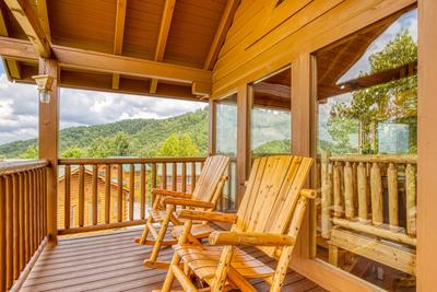 Awesome Views upper level deck with rocking chairs