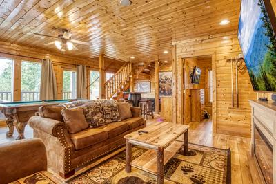 Awesome Views lower level sitting area with 75 inch TV and pool table