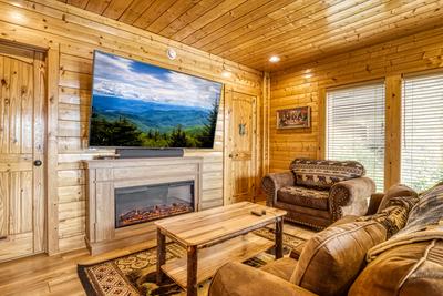 Awesome Views lower level sitting area with 75 inch TV
