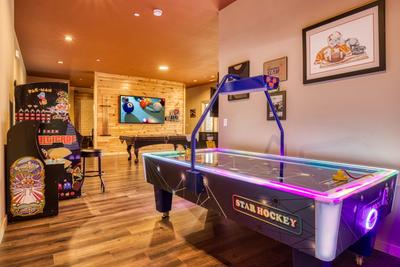 Smoky Mountain Gold game room with air hockey, pool table, and multicade game system
