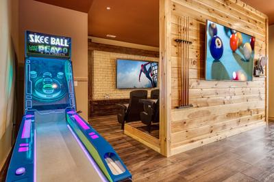 Smoky Mountain Gold game room with skeeball and movie theater