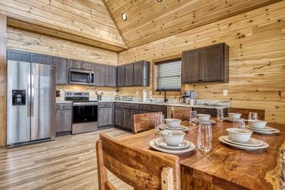 View to a Thrill dining area and fully furnished kitchen