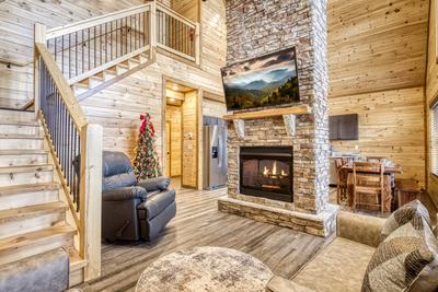 View to a Thrill living room with recliner and 58 inch TV