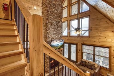 View to a Thrill view of living room from loft