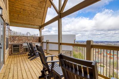 View to a Thrill main level deck with mountain views