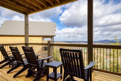 View to a Thrill lower level deck with mountain views
