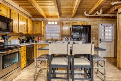 Dining area and fully furnished kitchen