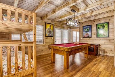 Ole Red main level bedroom with pool table and bunk beds